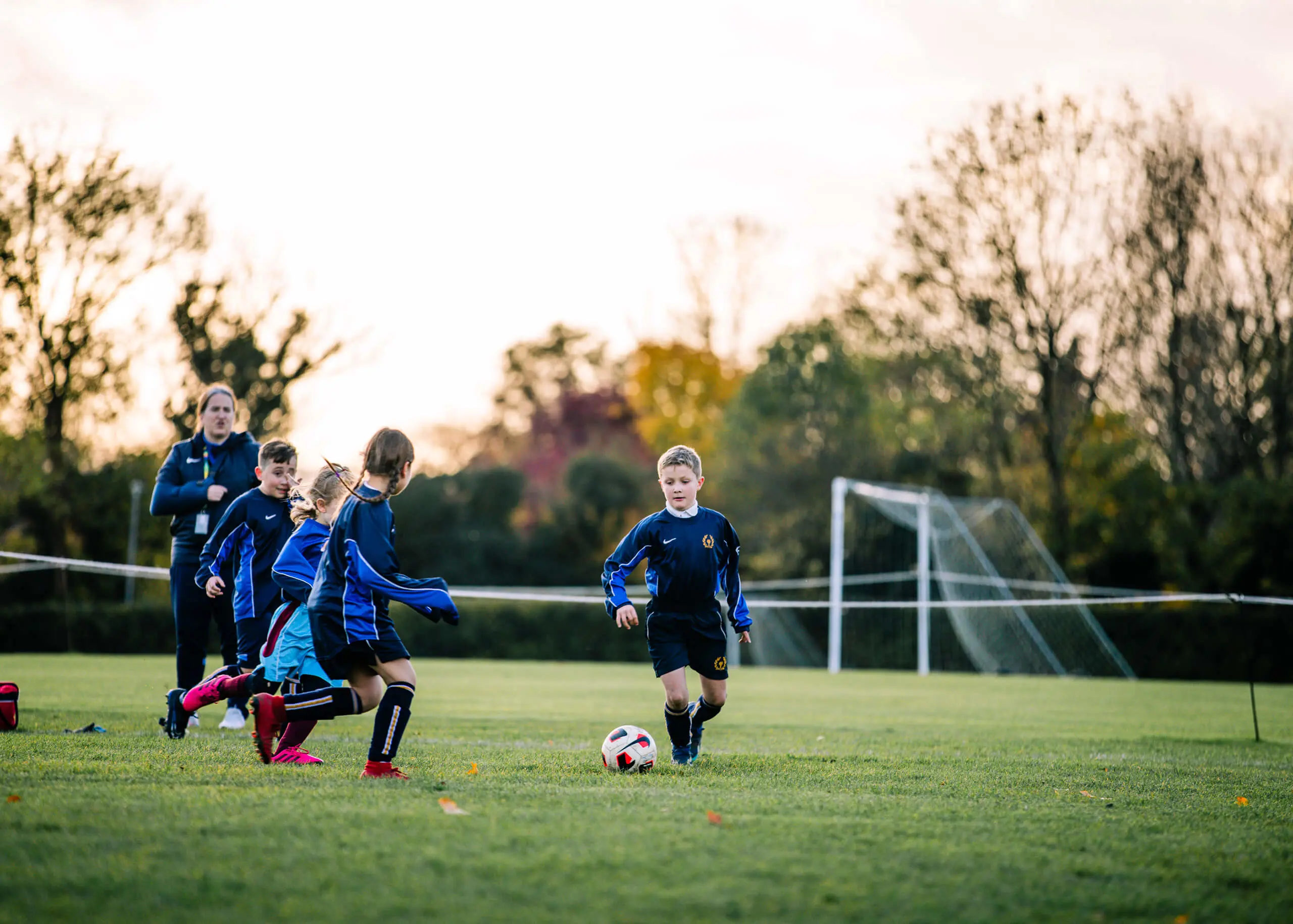 Pupils playing football at St Chris