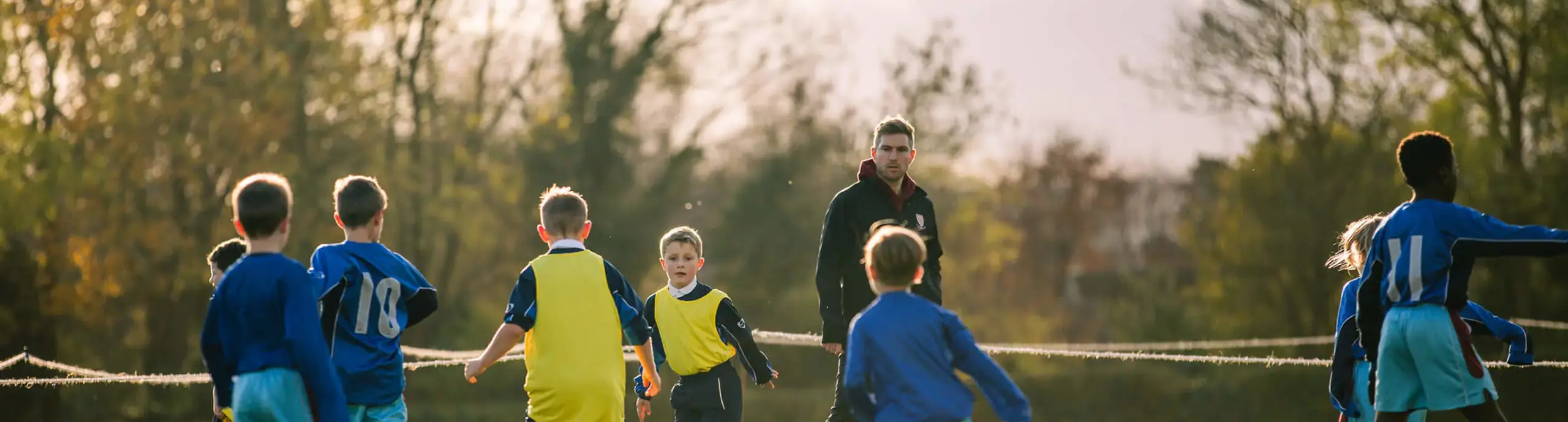 Junior School pupils playing football at St Chris