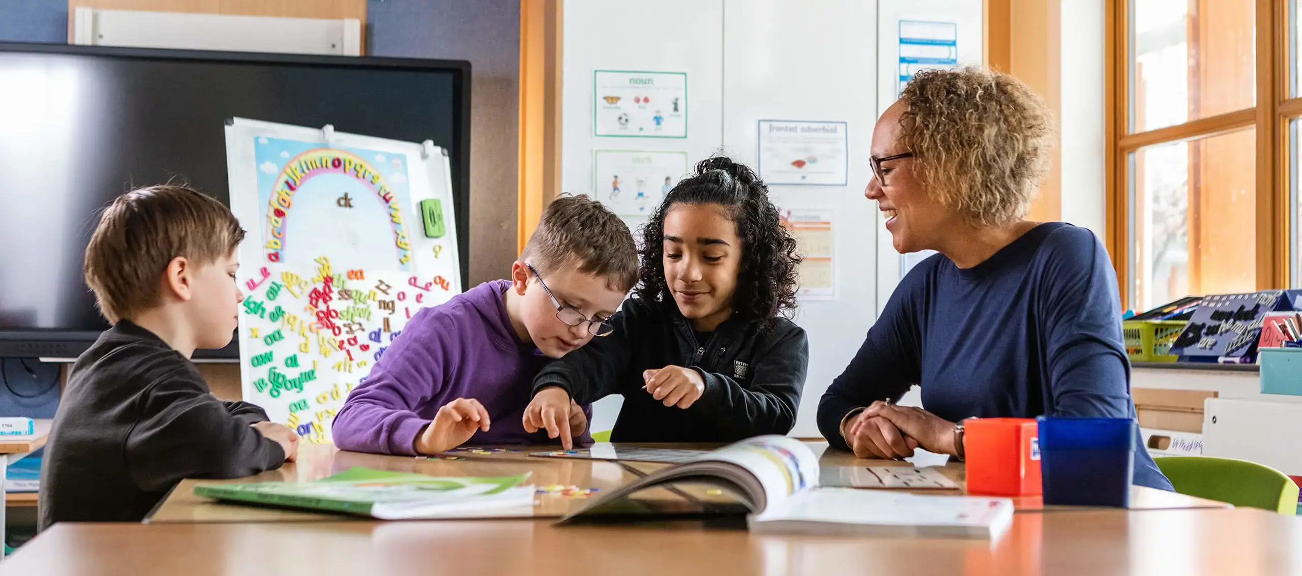 Pupils in class with teacher