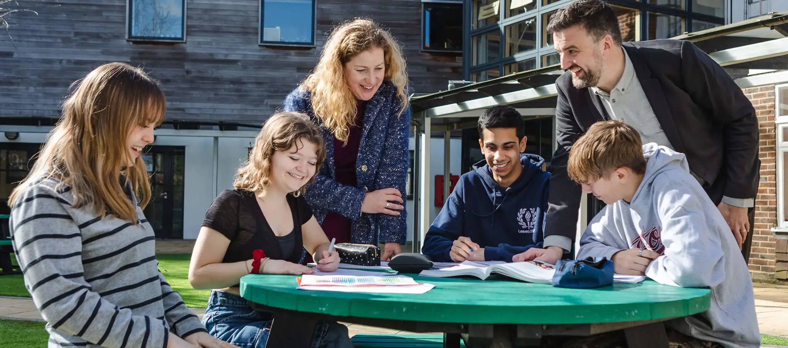 Senior School students working outside with their teachers at St Chris